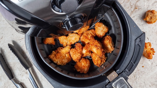 pieces of fried chicken in an air fryer